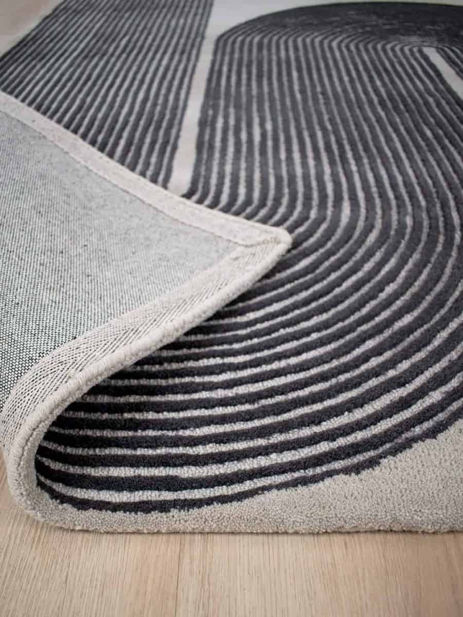 Viper-ink-stans-rug-centre-wool-rug-carved-grey-wool-carver-curves