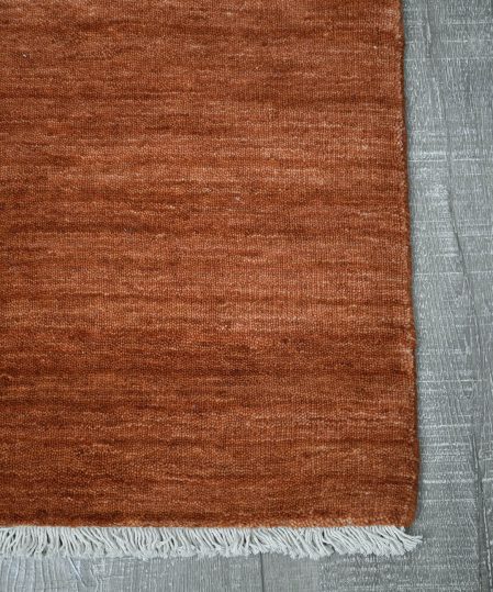 Diva-Ochre-orange-stans-rug-centre-hand-loom-knotted-pure-wool-rug-